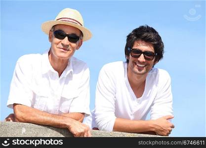 Portrait of a two men outdoors with sunglasses