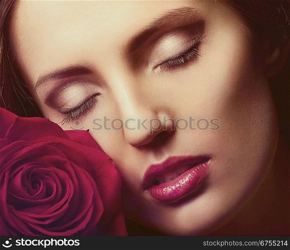 Portrait of a woman&acute;s face with rose