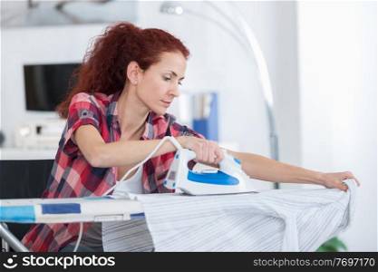 portrait of a woman doing household chores