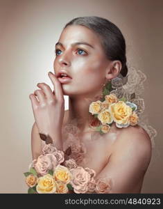 Portrait of a woman. Flowers. Concept.