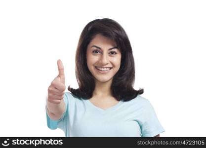 Portrait of a woman giving thumbs up