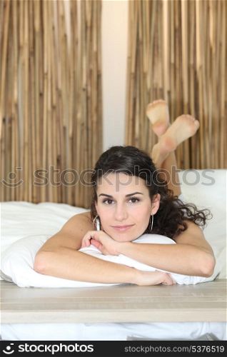 Portrait of a woman in bed