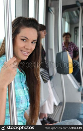 portrait of a woman in public transportation