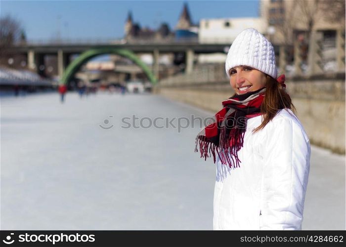 Portrait of a woman on the Ottawa Rideau Canal Skateway during winter