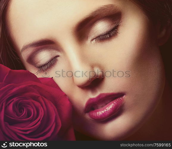 Portrait of a woman&rsquo;s face with rose