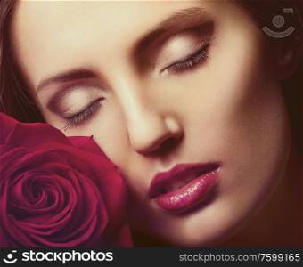 Portrait of a woman&rsquo;s face with rose
