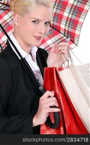 portrait of a woman under umbrella