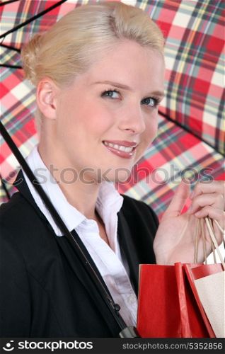 portrait of a woman under umbrella