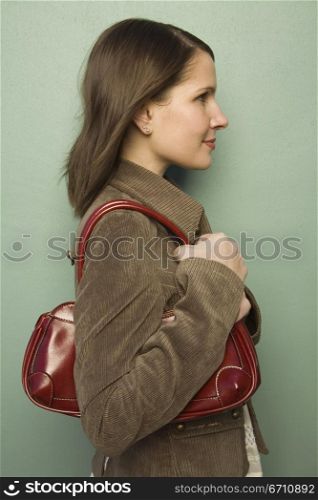 Portrait of a woman with a bag