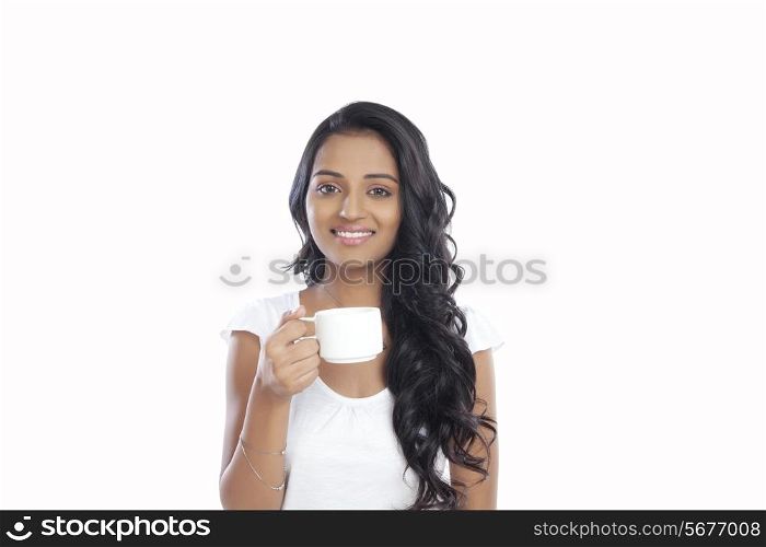 Portrait of a woman with a cup of coffee