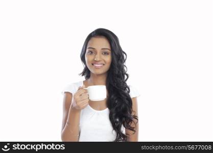 Portrait of a woman with a cup of coffee