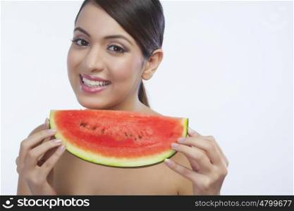 Portrait of a woman with a watermelon