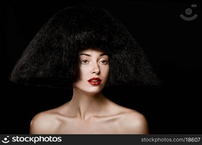 Portrait of a woman with bouffant and red lips