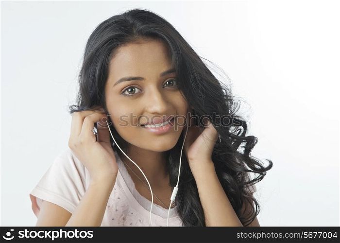 Portrait of a woman with ear phones