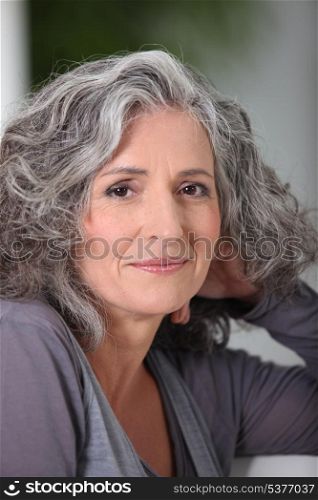 Portrait of a woman with salt and pepper hair