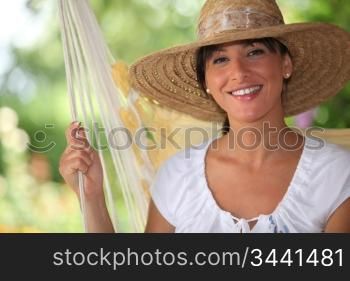 portrait of a woman with straw hat