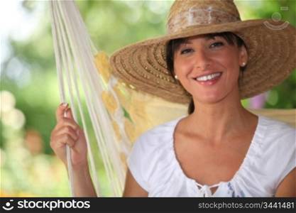 portrait of a woman with straw hat