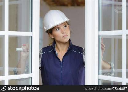 portrait of a woman working with window