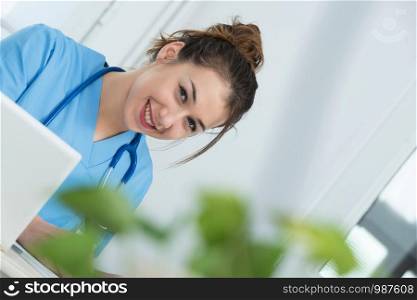 portrait of a young and smiling female doctor