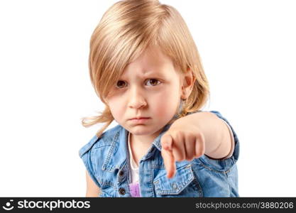 Portrait of a young angry girl pointing up