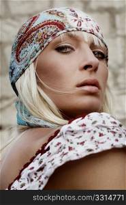 Portrait of a young attractive blond beauty, hippie look