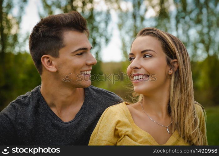 Portrait of a young beautiful couple smiling