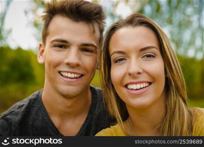 Portrait of a young beautiful couple smiling