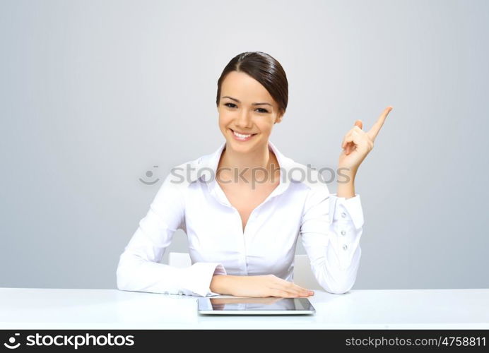 POrtrait of a young beautiful woman in business wear at work