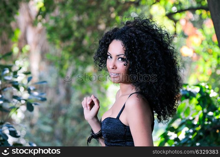 Portrait of a young black woman in the park