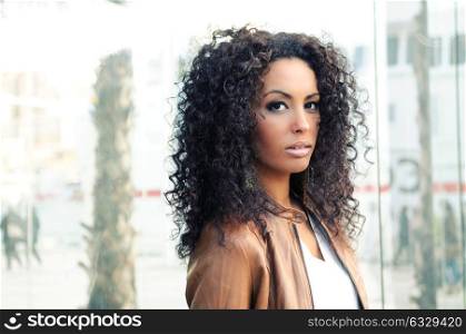 Portrait of a young black woman, model of fashion