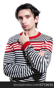 Portrait of a young brunet men in striped sweater on white background