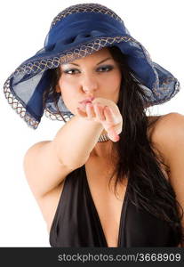 portrait of a young brunette with blue hat making funny face