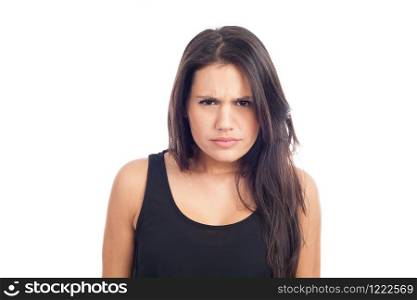 portrait of a young brunette woman angry and angry
