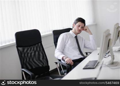 Portrait of a young business man looking depressed and worried from work at meeting office indors