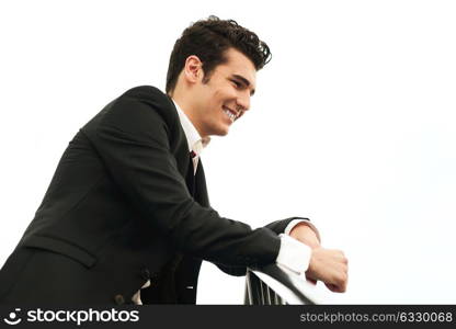 Portrait of a young businessman in urban background