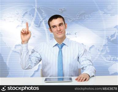 Portrait of a young businessman making presentation