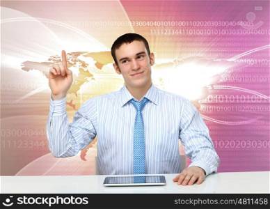 Portrait of a young businessman making presentation