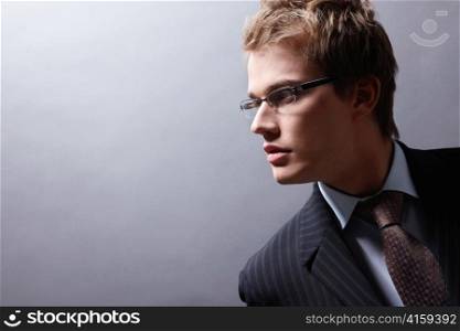 Portrait of a young businessman wearing glasses