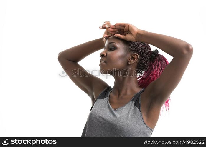 Portrait of a young cheerful african sport woman isolated on white background