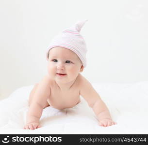 Portrait of a young child on a white background. Baby.