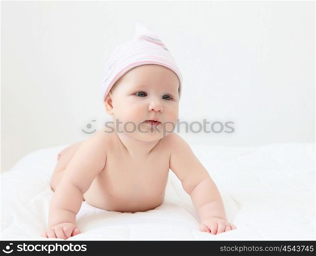 Portrait of a young child on a white background. Baby.