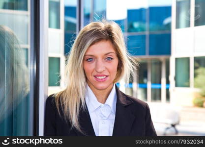 Portrait of a young confident business woman smiling