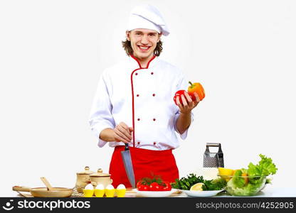 Portrait of a young cook in uniform