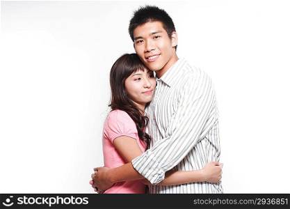 Portrait of a young couple embracing