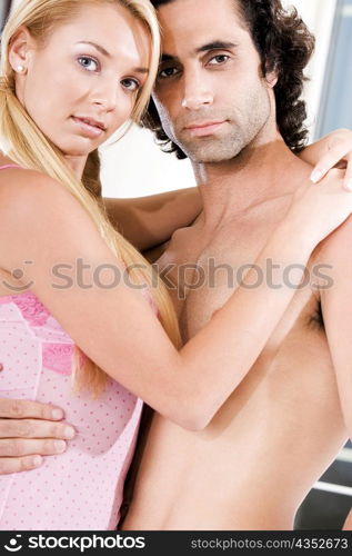 Portrait of a young couple embracing each other