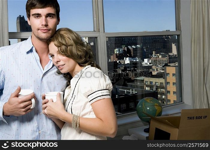 Portrait of a young couple having coffee