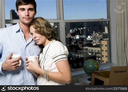Portrait of a young couple having coffee