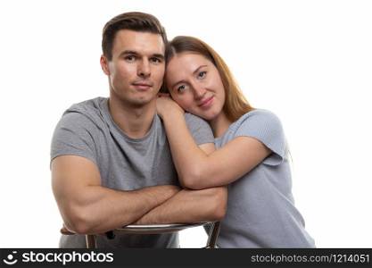 Portrait of a young couple of Europeans, white background