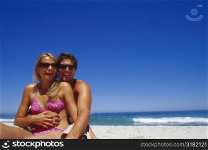 Portrait of a young couple on the beach