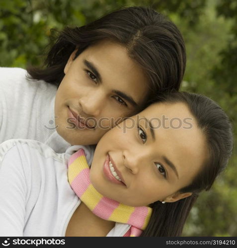 Portrait of a young couple smiling